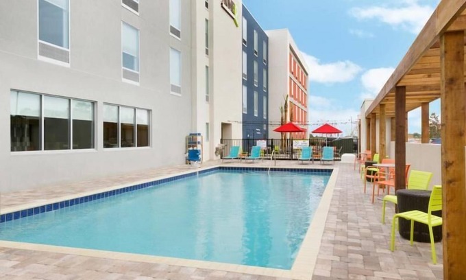 Airport North Apartment | Home Away From Home! Pet Friendly King Suite, Heated Pool & Free Breakfast!