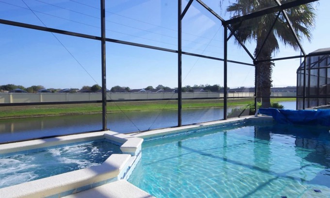 Windsor Palms House | Modern Pool Home, 3 Master Suites, Lake View & Games Rm Disney 3 Miles