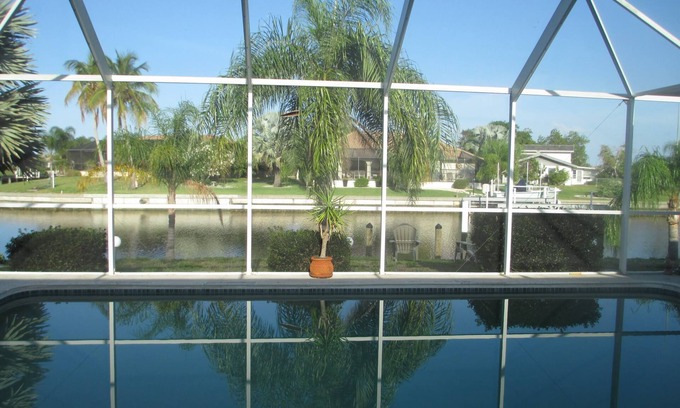 Punta Gorda House | Peaceful, canal home in desirable Punta Gorda Isles. Walk to Fishermen's Village