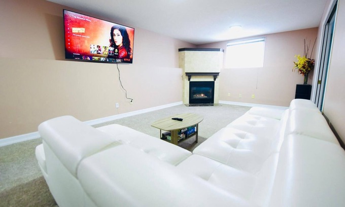 Amherstview House | Spacious Hearth Escape with Natural Light & fireplace