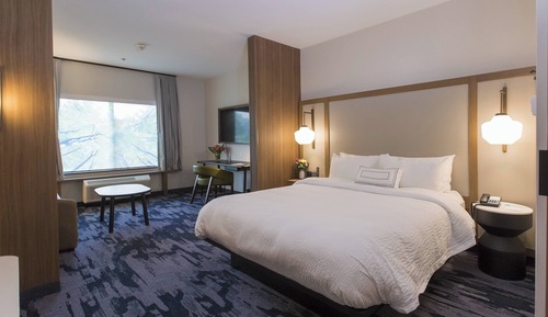 Suite, 1 King Bed with Sofa bed, Hearing Accessible (Roll-in Shower)