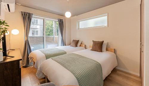 Twin Room with Private Bathroom