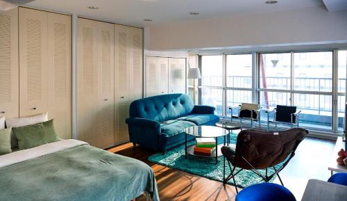 One-Bedroom Apartment with Balcony and City View