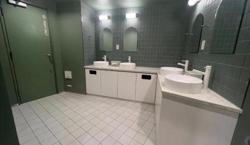 All gender floor Capsule Room